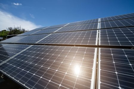 solar-panels-against-the-blue-sky-with-sunlight-2025-03-08-04-37-35-utc-scaled.jpg